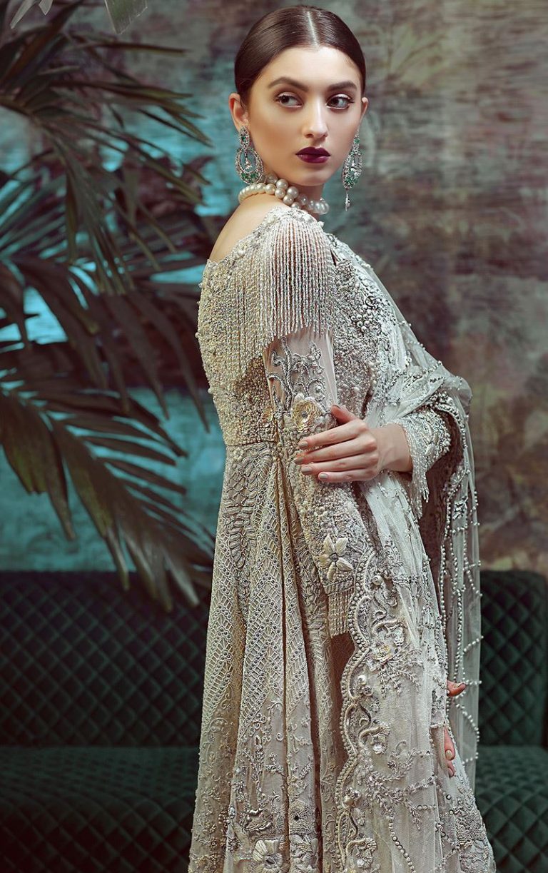 Beautiful heavily embroidered Pakistani bridal dress by Tena Durrani ...