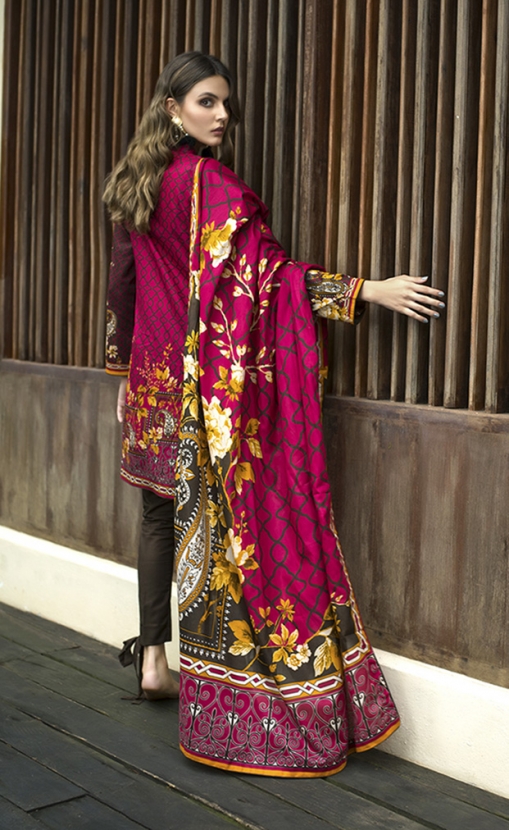Bold flower with paisley elements with irregular style. Dark colors to enhance the design by Komal printed lawn collection