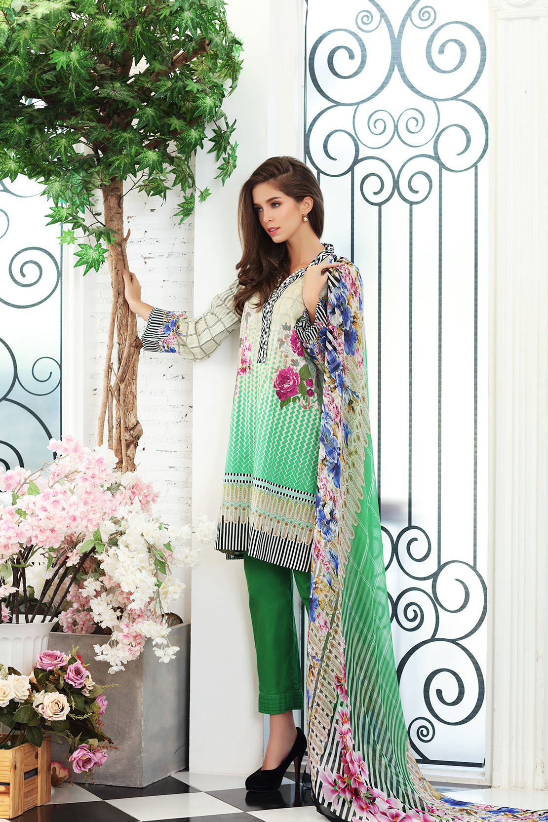 Buy this pretty embroidered stitched dress at a reasonable price available online by So Kamal embroidered clothes collection 2018