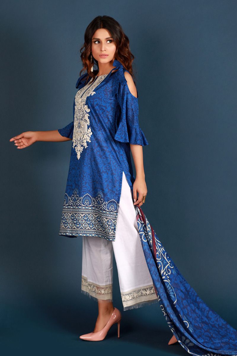 3 Piece Lawn Printed Cold Shoulder Shirt with Embroidery, Printed Chiffon Dupatta and Dyed Trouser. This Casual Dress is for girls going to office or university. 