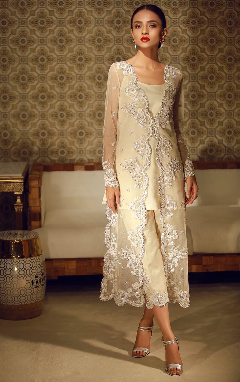 Graceful embroidered white 2 piece unstitched pret by Khaadi embroidered Eid prets 2018