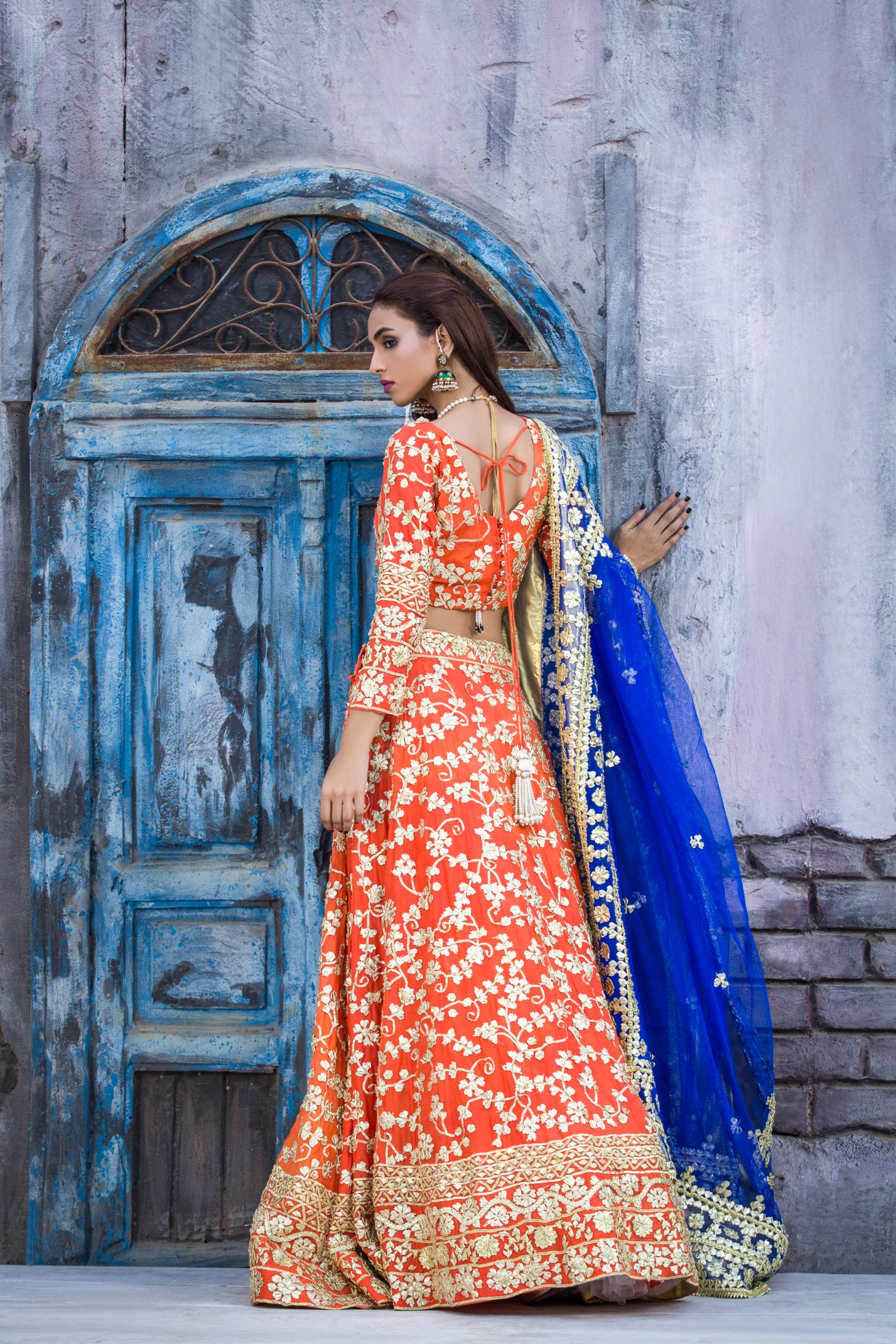 Buy this elegant and traditional orange silk lehanga by Sanober Azfar Lehanga collection at a reasonable price