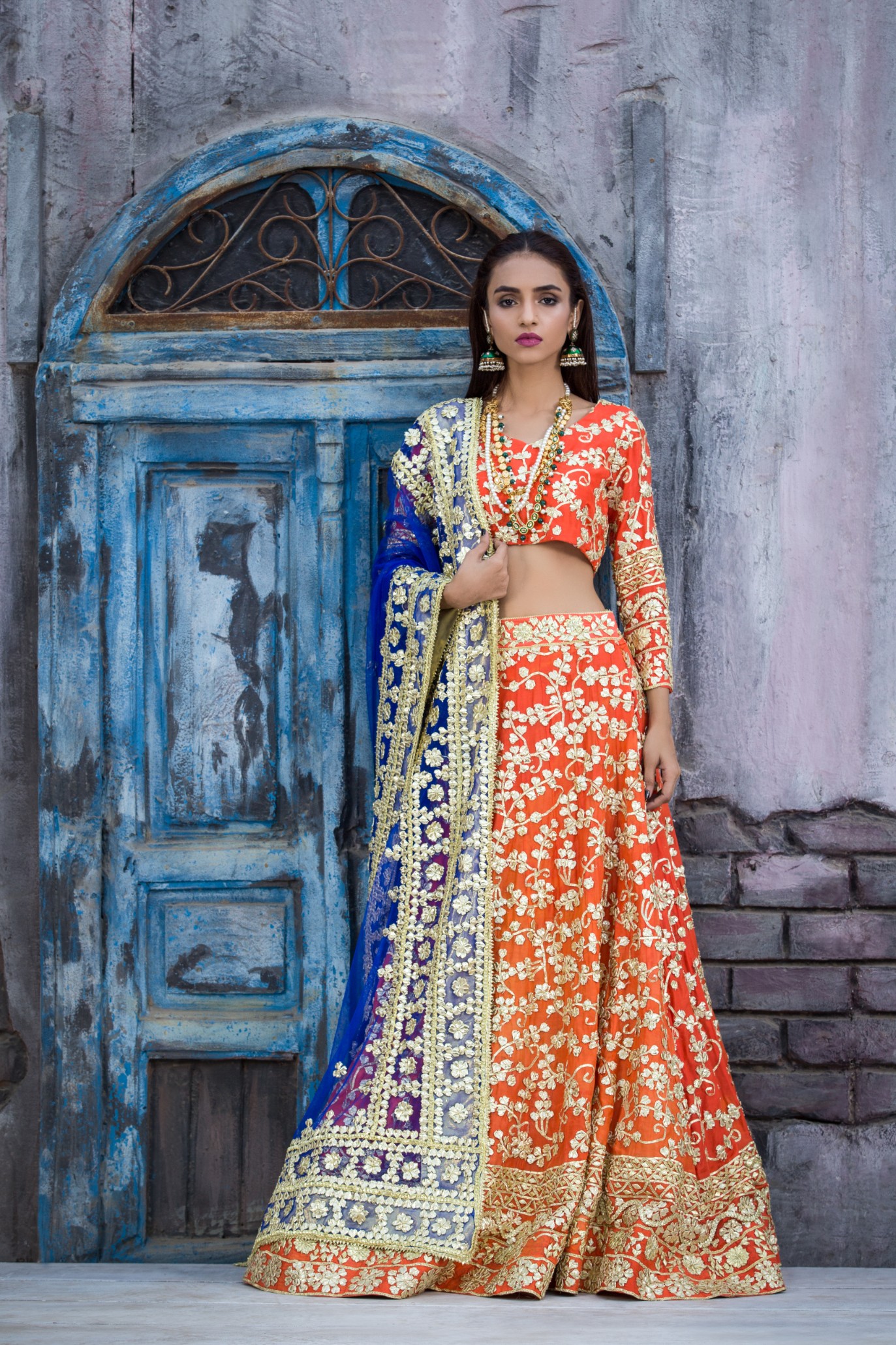 Pakistani orange color silk lehanga choli by Sanober Azfar Lehanga collection