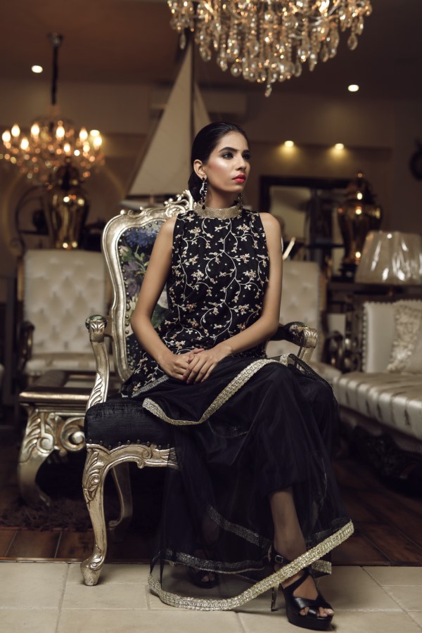 Pakistani party Closed necklined dress, in black. besides, stone, beads, embroidery and embellishments style it up