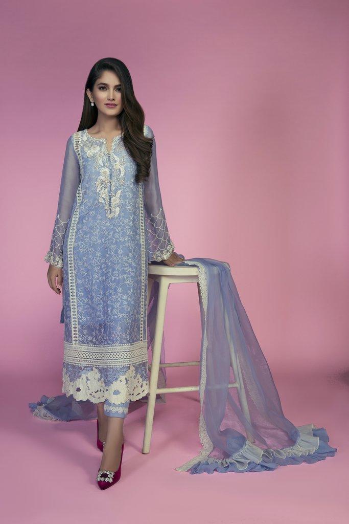 A beautiful and stylish Pakistani eid dress by Mina Hassan in ice blue color