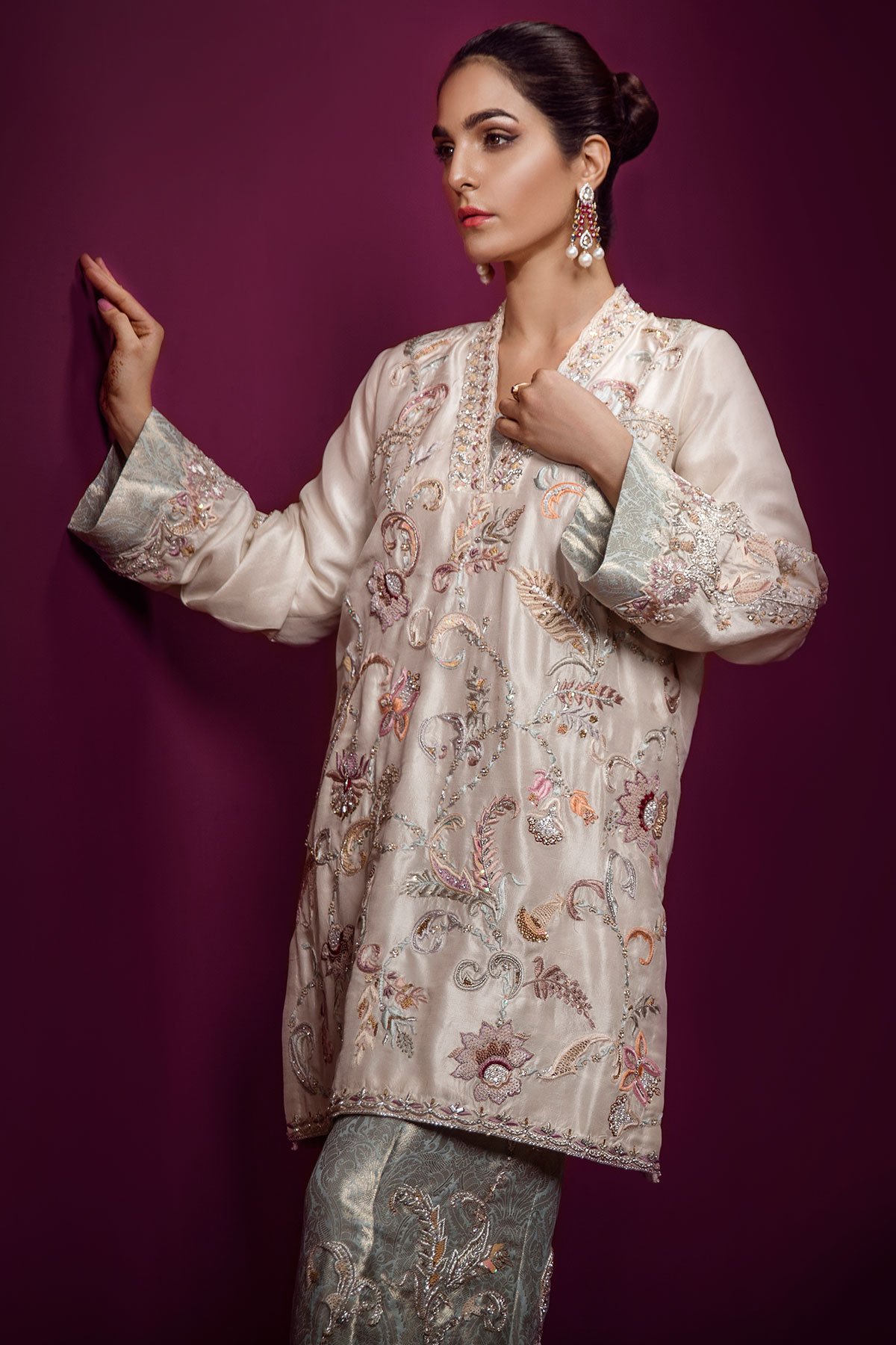 A beautiful laboriously hand embroidered tunic covered with minute sequins