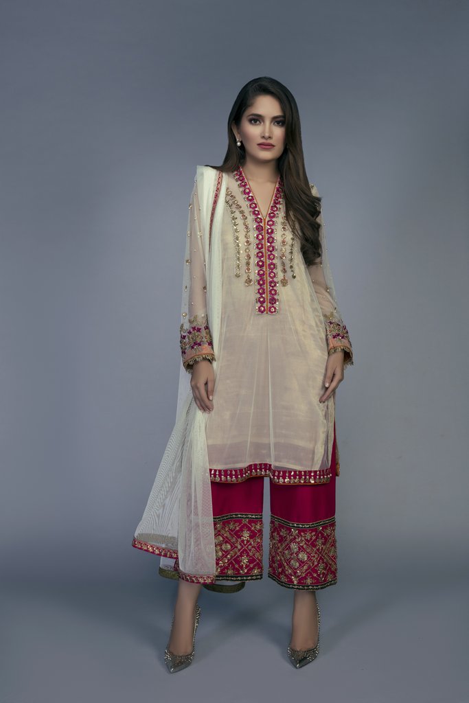 Beautiful organza off white Pakistani wedding dress by Mina Hasan