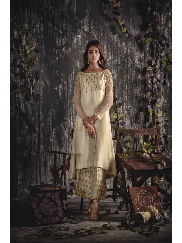 Beautiful pure raw silk off white embellished Pakistani semi formal dress by Umsha