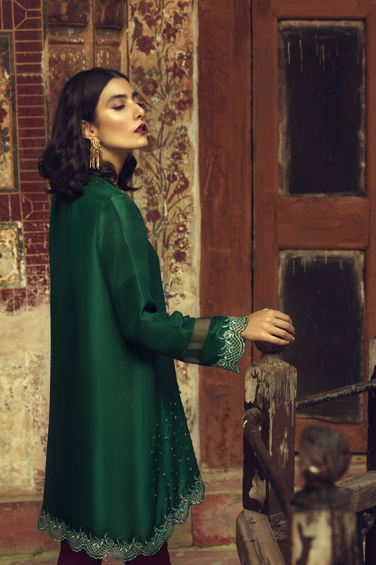 Buy this beautiful Pakistani party dress by Ammara Khan in green