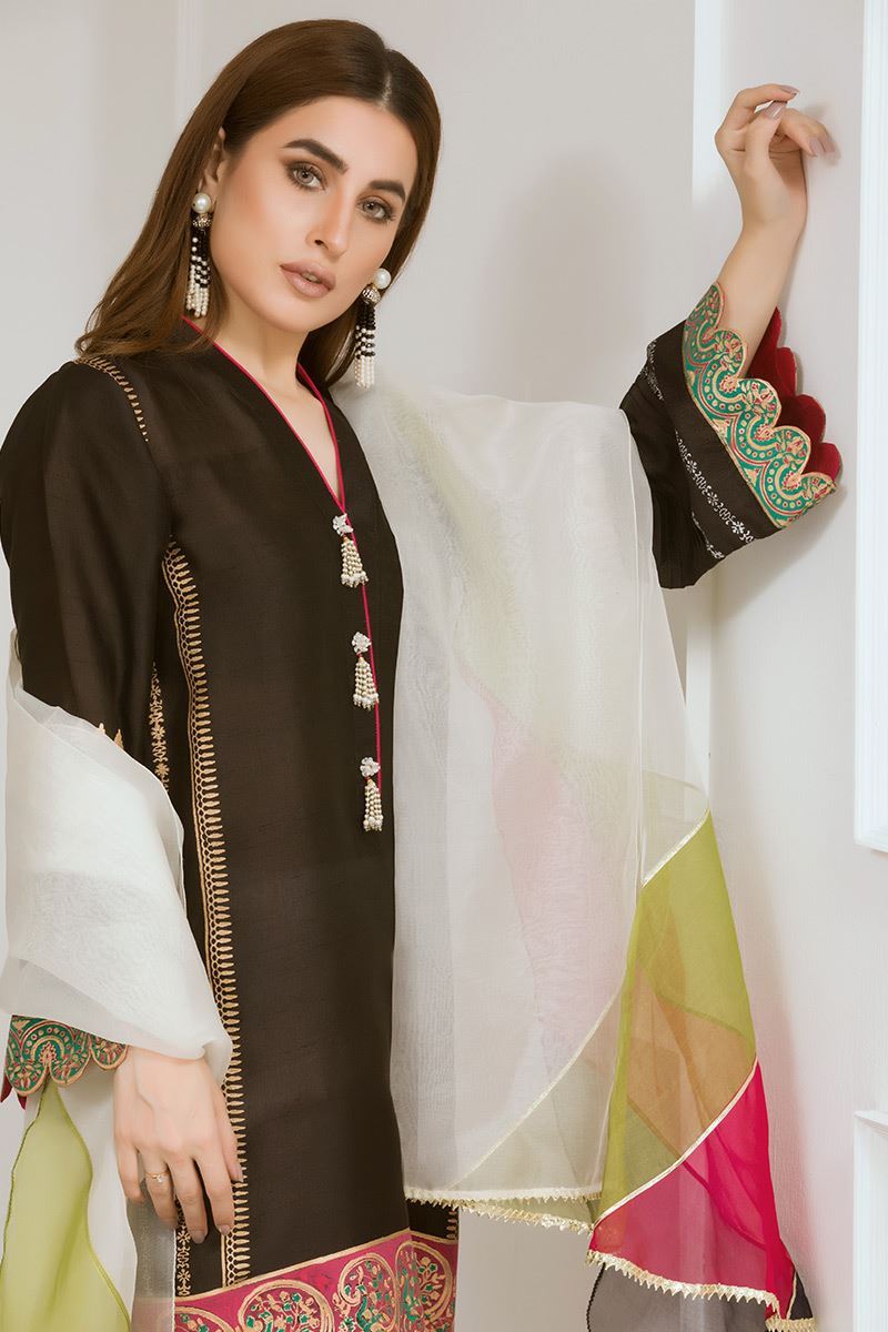 Buy this elegant Pakistani embroidery dress by Annus Abrar.