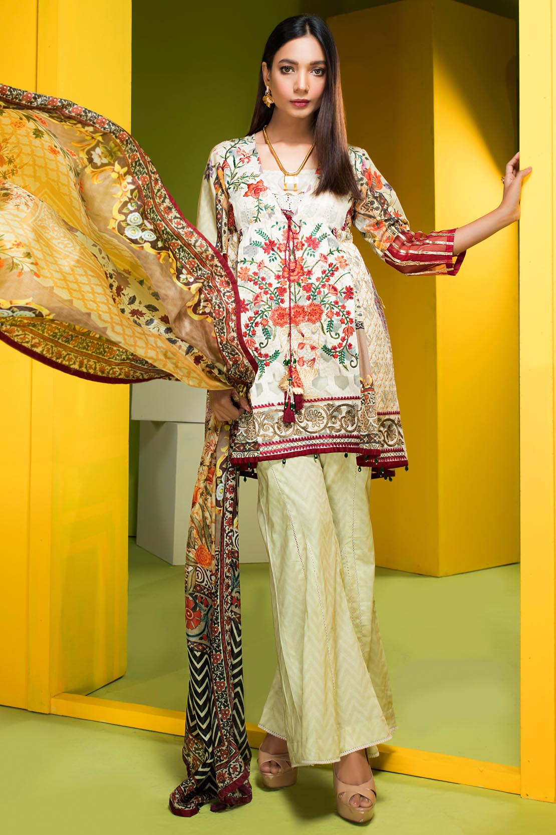 Buy this pretty Pakistani semi formal dress by Warda Saleem in cream color