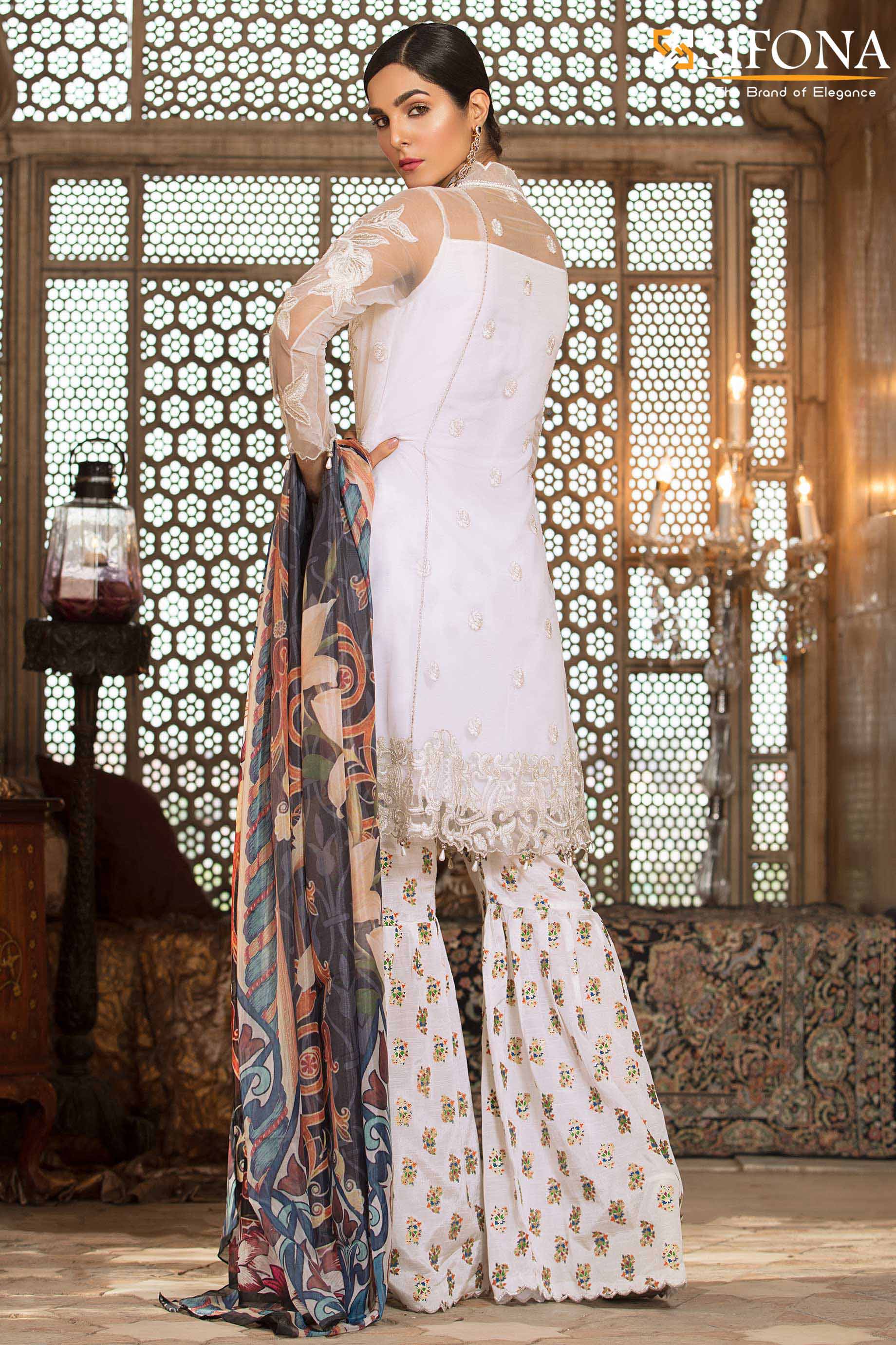 Buy this pretty white Pakistani semi formal dress by Sifona