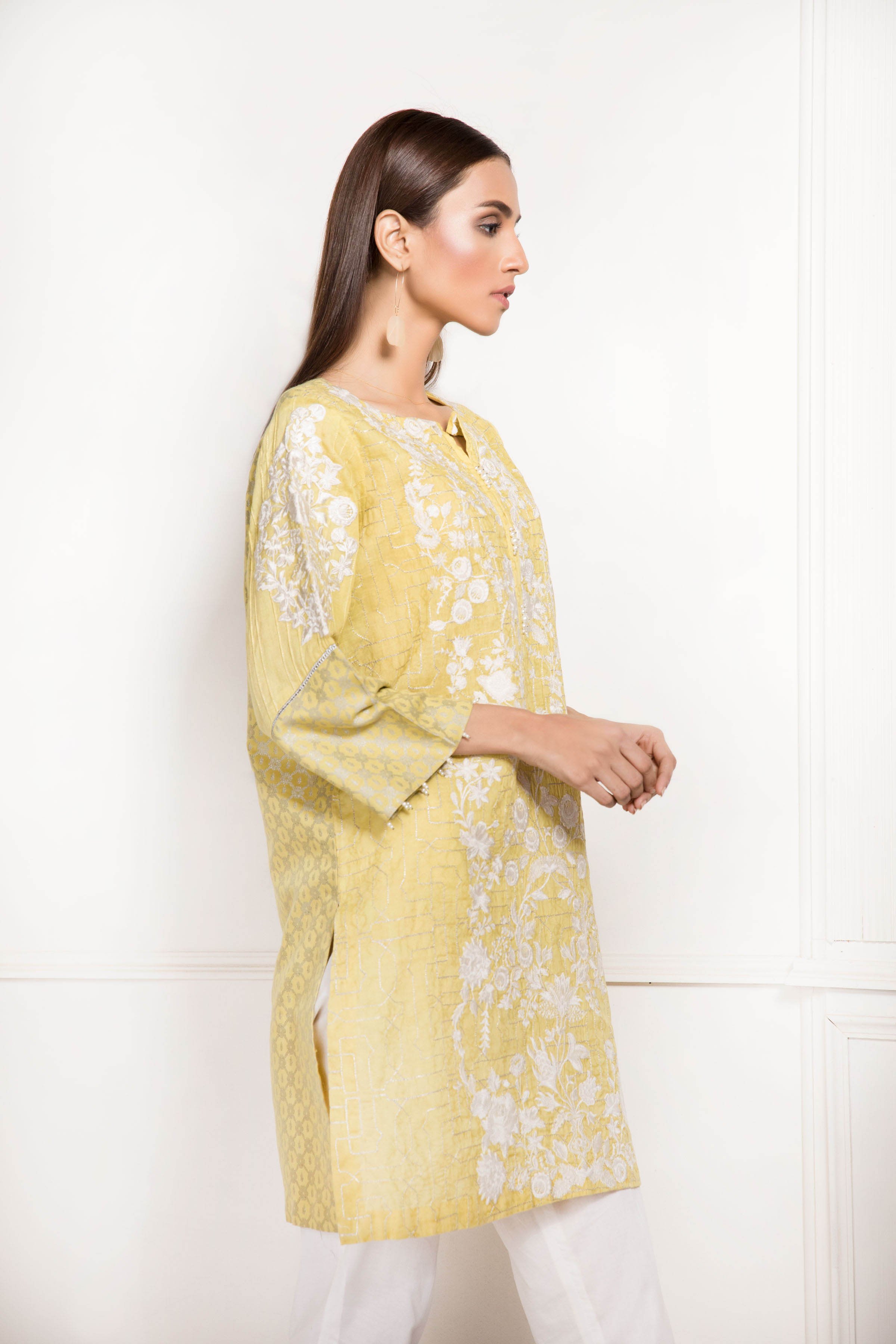 Buy this pretty yellow colored Pakistani cotton suit by Sapphire.Buy this pretty yellow colored Pakistani cotton suit by Sapphire.