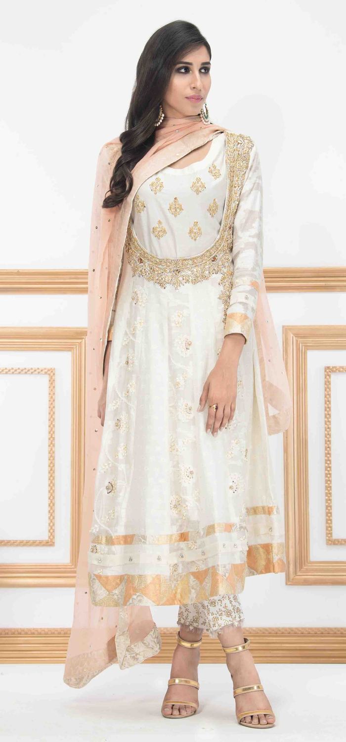 Offwhite block print shirt with tila and sequins paired with tea-pink dupatta with sequin spray