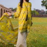 Pretty yellow printed Pakistani lawn suit by Warda Saleem