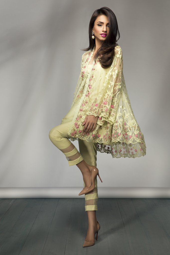 Stylish and pretty green embrodiered Pakistani formal dress by Mina Hasan