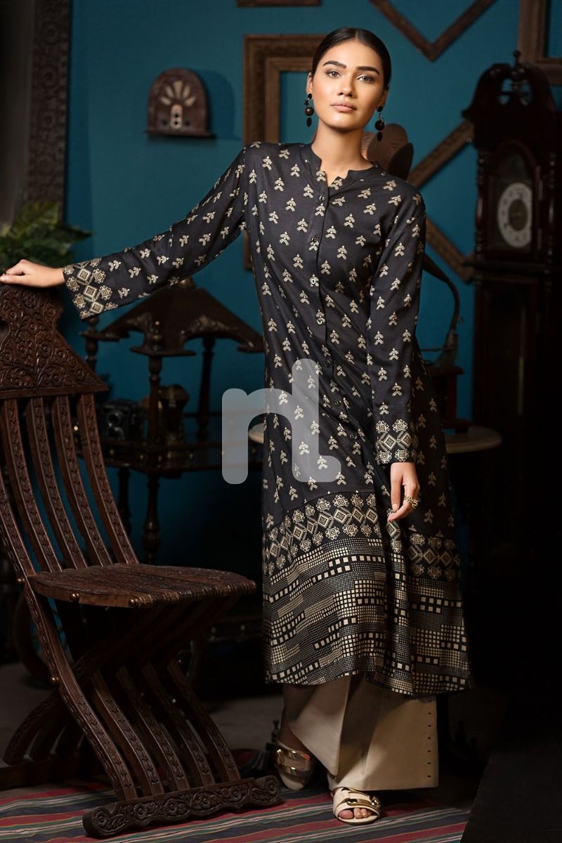 A elegant black long frock dress available by Nishat Linen