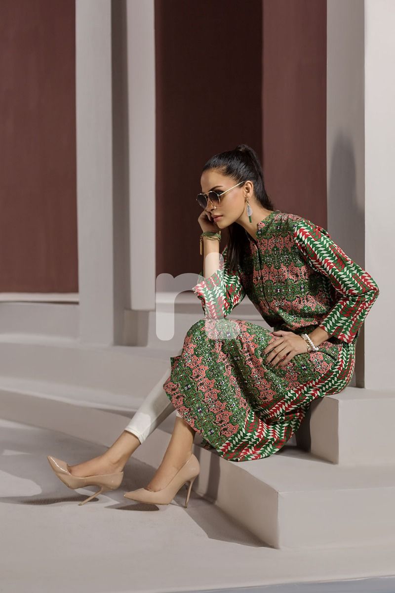 A stylish front open button down khaddar dress by Nishat