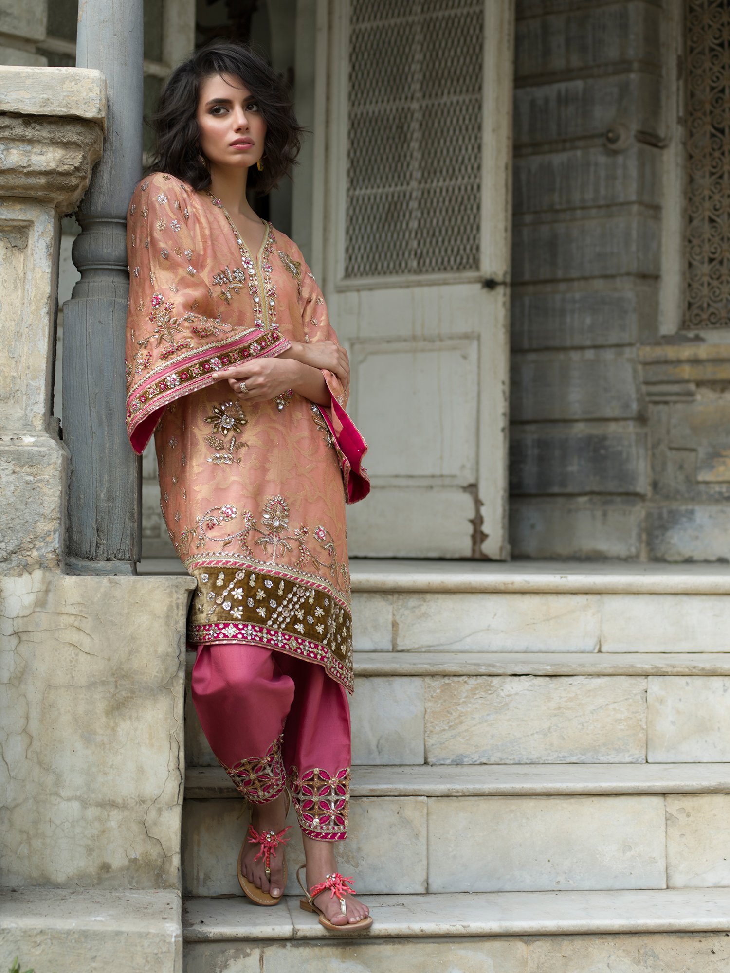 Crafted from peach spun-net with a soft pink raw silk skinny shalwar